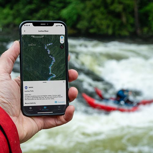 Phone in hand displaying PaddleWays map